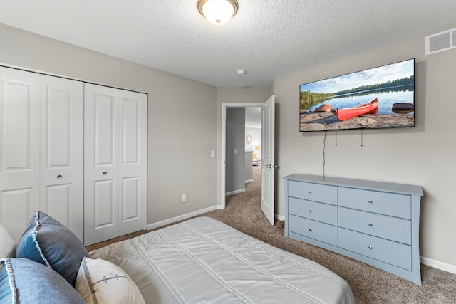 6317 153rd St, Savage, MN 55378 - bedroom with carpet floors, baseboards, a textured ceiling, and a closet