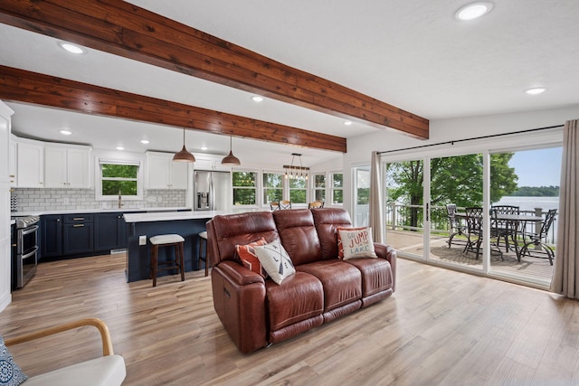 30558 376th Ave, Nordland Twp, MN 56431 - living room with recessed lighting, light wood-type flooring, and beamed ceiling