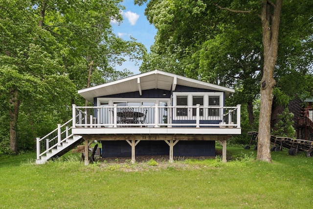 30558 376th Ave, Nordland Twp, MN 56431 - back of property featuring a lawn, a deck, and stairway