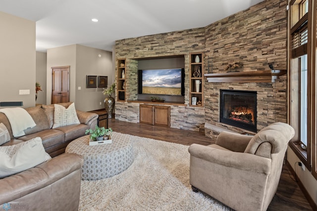 106 Beaton Dr, West Fargo, ND 58078 - living room with a fireplace, dark wood-style flooring, and recessed lighting
