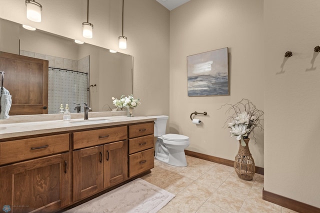 106 Beaton Dr, West Fargo, ND 58078 - full bath featuring toilet, baseboards, vanity, tile patterned floors, and a shower with curtain