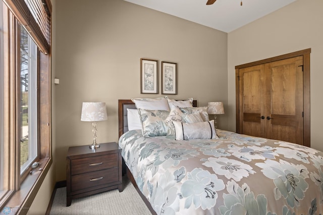 106 Beaton Dr, West Fargo, ND 58078 - bedroom with light carpet, a closet, a ceiling fan, and baseboards