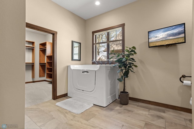 106 Beaton Dr, West Fargo, ND 58078 - laundry area with baseboards
