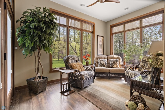 106 Beaton Dr, West Fargo, ND 58078 - living room featuring a ceiling fan, wood finished floors, and baseboards