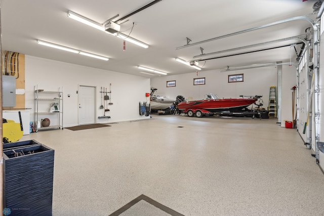 106 Beaton Dr, West Fargo, ND 58078 - garage featuring electric panel and a garage door opener