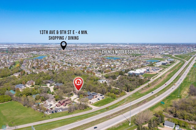 106 Beaton Dr, West Fargo, ND 58078 - aerial view of property's location with a large body of water and a main thoroughfare