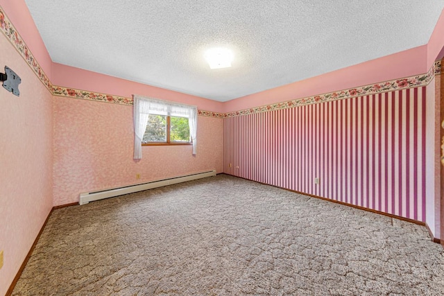 16 Crestview Bay, Faribault, MN 55021 - spare room featuring a baseboard heating unit, carpet floors, and a textured ceiling