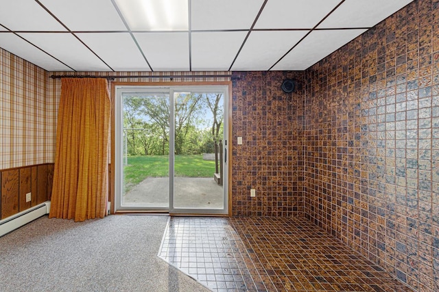 16 Crestview Bay, Faribault, MN 55021 - spare room with a paneled ceiling and baseboard heating