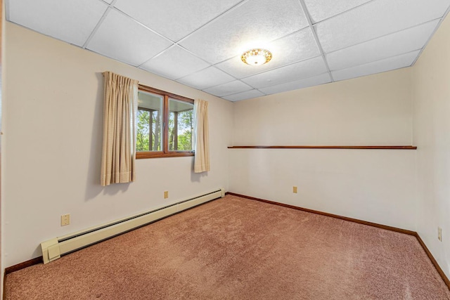 16 Crestview Bay, Faribault, MN 55021 - spare room with a baseboard heating unit, carpet floors, a drop ceiling, and baseboards