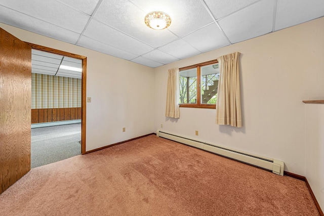 16 Crestview Bay, Faribault, MN 55021 - carpeted empty room featuring a baseboard heating unit, a paneled ceiling, and baseboards