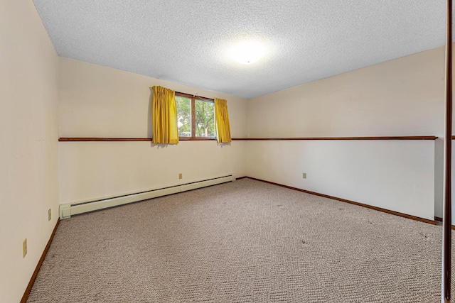 16 Crestview Bay, Faribault, MN 55021 - empty room with a baseboard heating unit, carpet, a textured ceiling, and baseboards