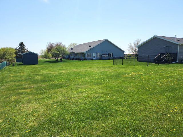 305 4th Ave SW, Milltown, WI 54858 - view of yard with a storage shed and an outdoor structure