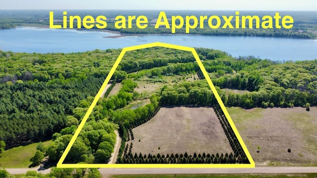 28075 Zuni St NW, Isanti, MN 55040 - view of property location with a nearby body of water, property boundaries highlighted, and a forest