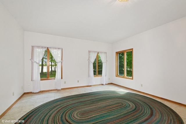 28075 Zuni St NW, Isanti, MN 55040 - empty room with baseboards