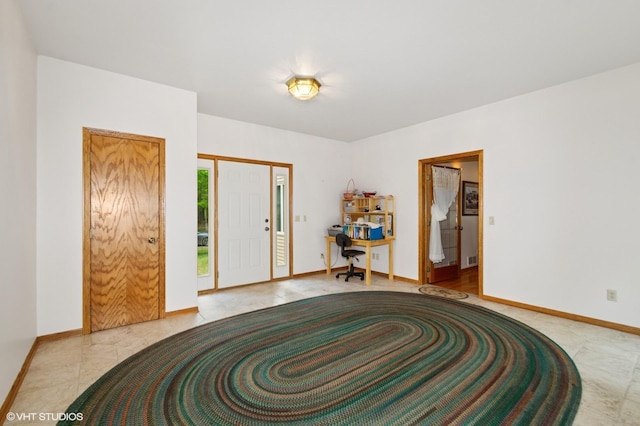 28075 Zuni St NW, Isanti, MN 55040 - foyer entrance with baseboards and tile patterned flooring