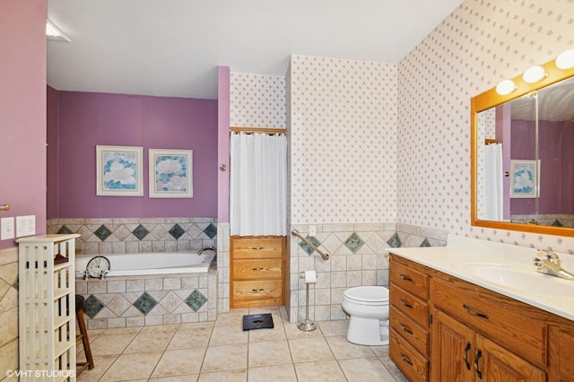 28075 Zuni St NW, Isanti, MN 55040 - bathroom featuring tile patterned floors, wallpapered walls, a wainscoted wall, toilet, and vanity
