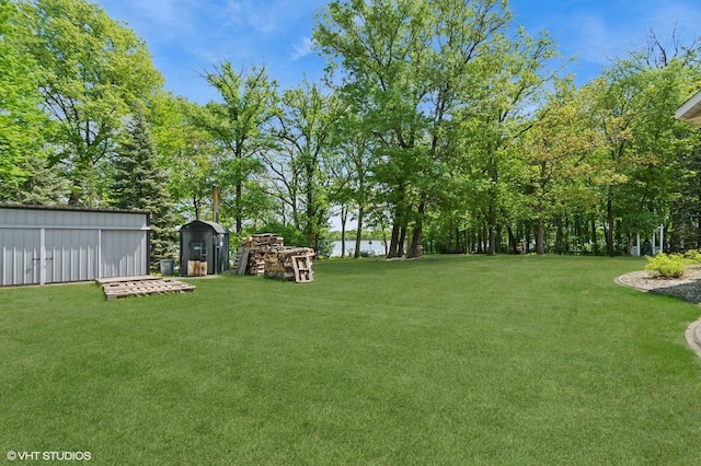 28075 Zuni St NW, Isanti, MN 55040 - view of green lawn with an outbuilding and view of scattered trees