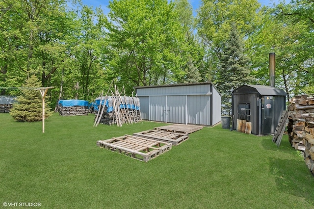 28075 Zuni St NW, Isanti, MN 55040 - view of grassy yard featuring an outbuilding and a shed