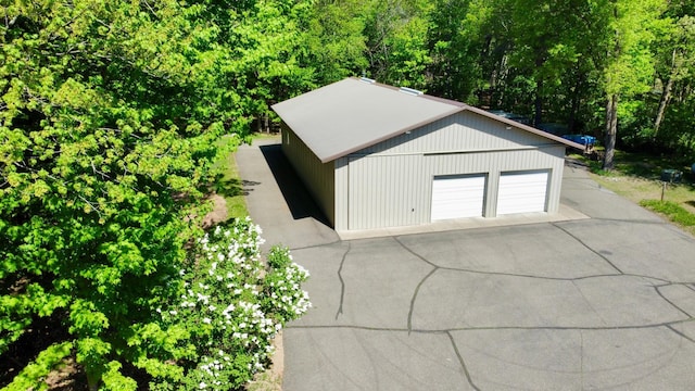 28075 Zuni St NW, Isanti, MN 55040 - garage with asphalt driveway