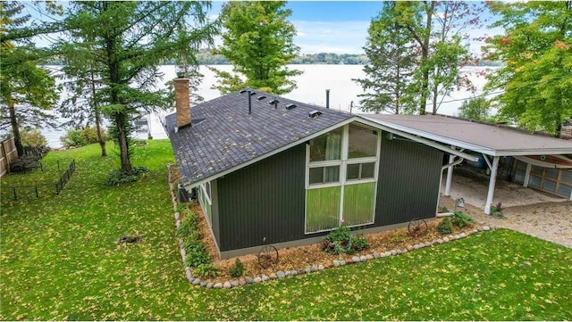 29408 Francis Lake Dr NW, Bradford Twp, MN 55040 - back of house featuring a chimney and a water view