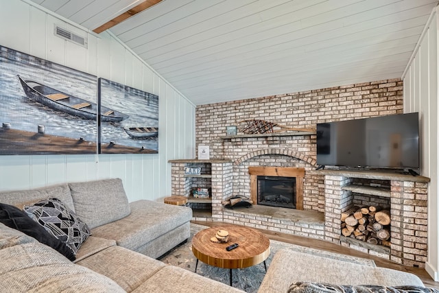 29408 Francis Lake Dr NW, Bradford Twp, MN 55040 - living area featuring a fireplace and wood finished floors