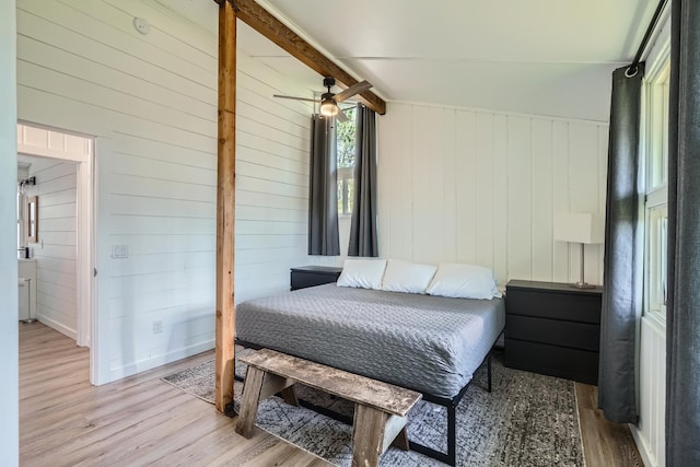 29408 Francis Lake Dr NW, Bradford Twp, MN 55040 - bedroom featuring wood finished floors and wooden walls