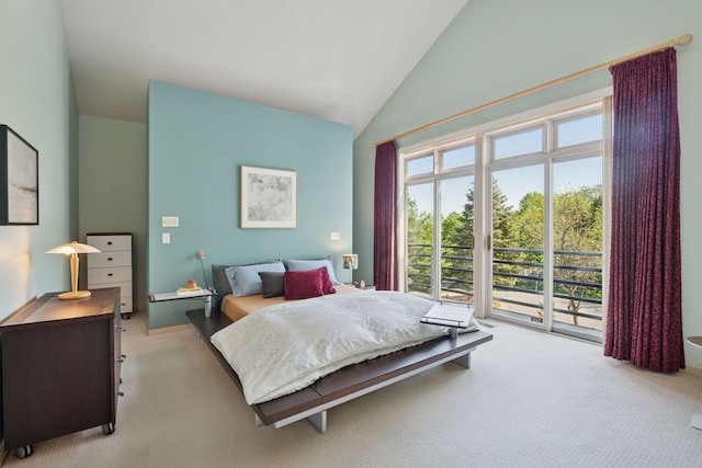 bedroom with carpet floors, access to exterior, and vaulted ceiling