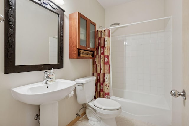 full bath with toilet, shower / tub combo, and tile patterned flooring