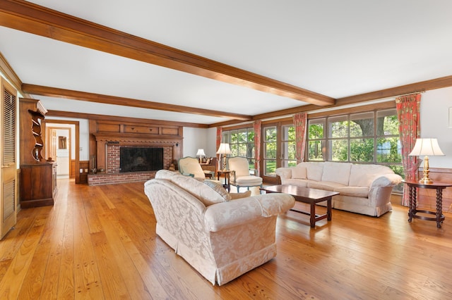 1429 20th St SW, Rochester, MN 55902 - living area featuring beam ceiling, light wood-style floors, and a brick fireplace