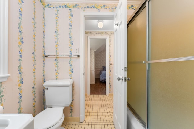 1429 20th St SW, Rochester, MN 55902 - bathroom with tile patterned flooring, a shower with door, and wallpapered walls