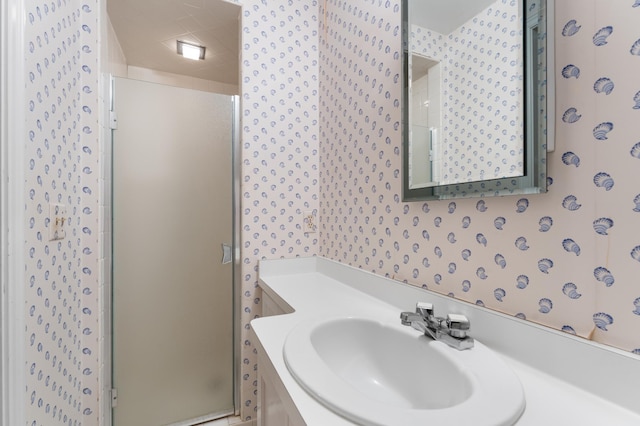 1429 20th St SW, Rochester, MN 55902 - full bathroom featuring a shower stall, wallpapered walls, and vanity