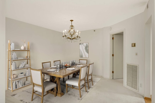 6566 France Ave S Unit 805, Edina, MN 55435 - dining area featuring a chandelier and carpet