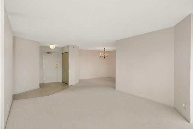 6566 France Ave S Unit 805, Edina, MN 55435 - empty room with light carpet and a chandelier