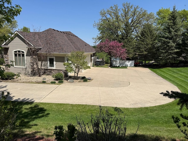view of basketball court featuring a yard