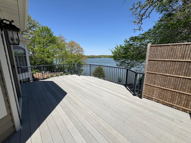 deck featuring a water view