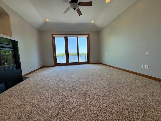 unfurnished living room featuring a ceiling fan, lofted ceiling, baseboards, carpet flooring, and recessed lighting