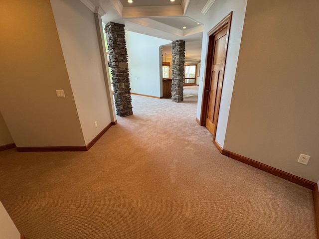 hallway featuring ornate columns, crown molding, light colored carpet, recessed lighting, and baseboards