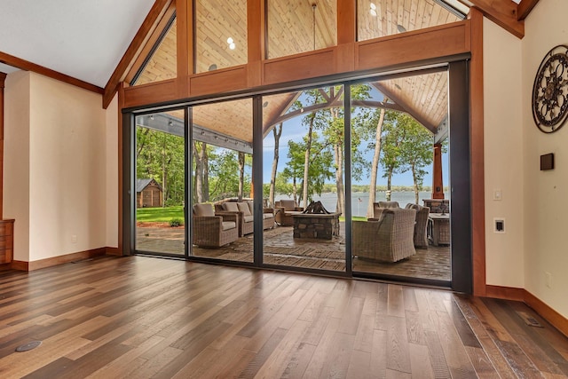 17488 Alexander Ct, Cold Spring, MN 56320 - entryway with hardwood / wood-style flooring, a water view, baseboards, beam ceiling, and high vaulted ceiling