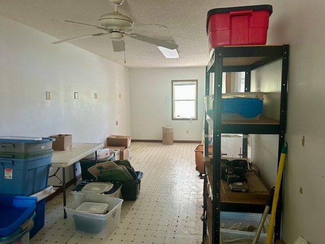 miscellaneous room featuring a ceiling fan