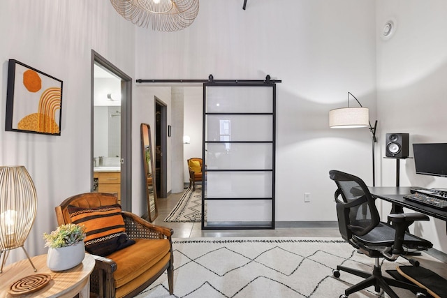tiled office space featuring a high ceiling
