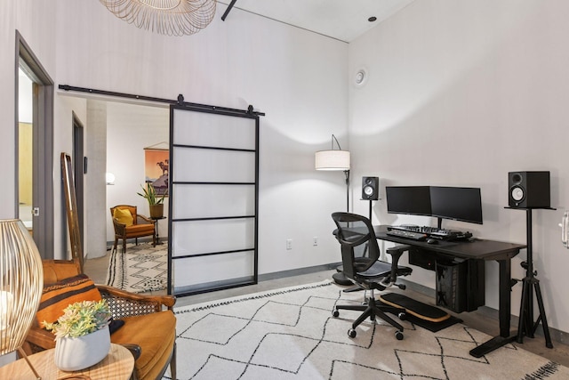 office space featuring concrete floors and baseboards