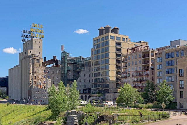 view of property with a city view