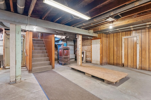 unfinished below grade area featuring stairs