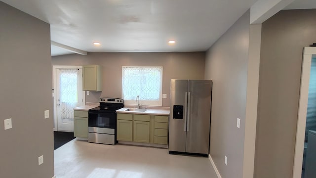 1808 Beach Dr SE, Forest Lake, MN 55025 - kitchen featuring appliances with stainless steel finishes, a sink, light countertops, baseboards, and recessed lighting
