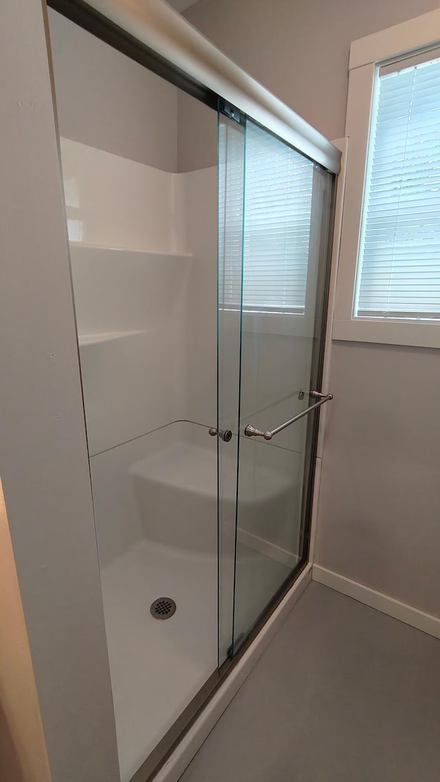 1808 Beach Dr SE, Forest Lake, MN 55025 - full bathroom with a stall shower and baseboards