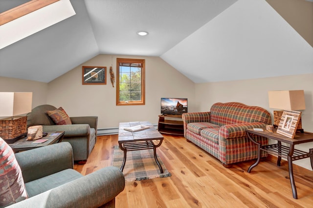 19336 Koetter Ct, Richmond, MN 56368 - living area with wood finished floors, vaulted ceiling, a baseboard heating unit, and a skylight