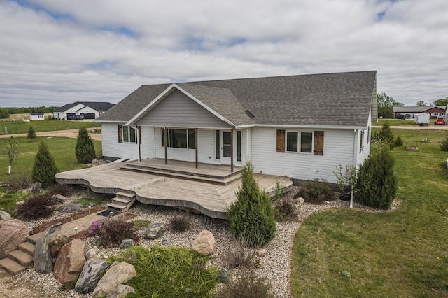 20171 Cassidy Ln, Audubon, MN 56511 - back of house featuring a lawn and a shingled roof