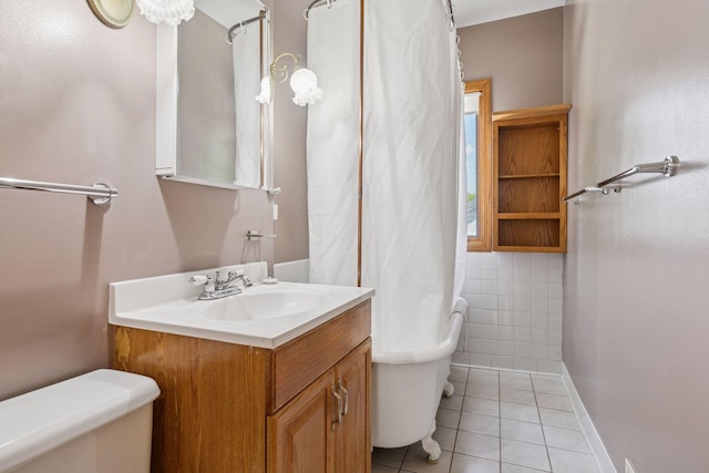 716 4th St NE, Minneapolis, MN 55413 - full bath with toilet, tile patterned flooring, a shower with curtain, vanity, and baseboards