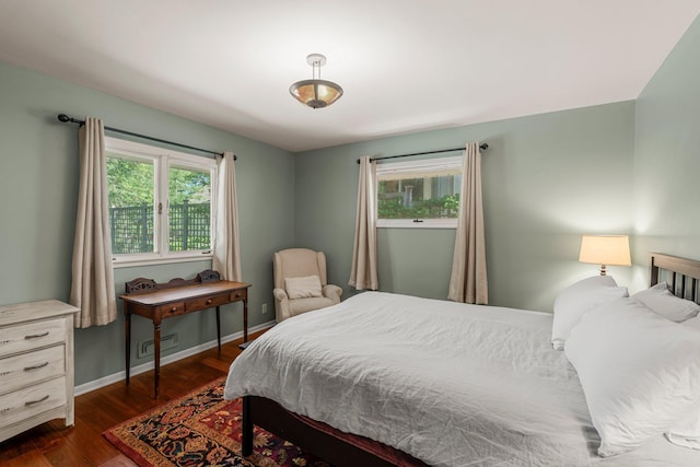 2532 Upton Ave S, Minneapolis, MN 55405 - bedroom featuring dark wood-type flooring and baseboards