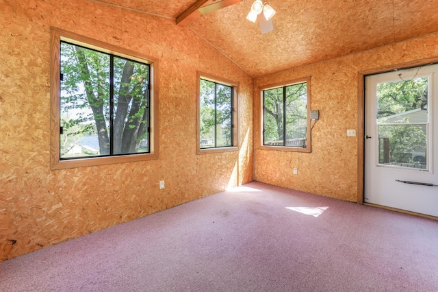 empty room featuring carpet floors, plenty of natural light, wallpapered walls, and ceiling fan